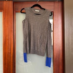 Sweater with blue sleeves